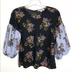 Ann Taylor Loft black floral top contrasting print on balloon sleeve
Size Small